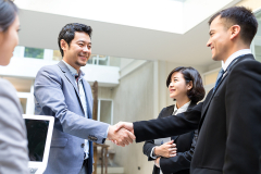 Business people make a deal