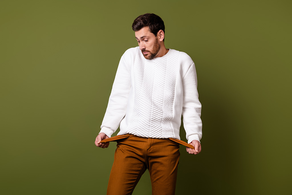 man showing his empty pockets