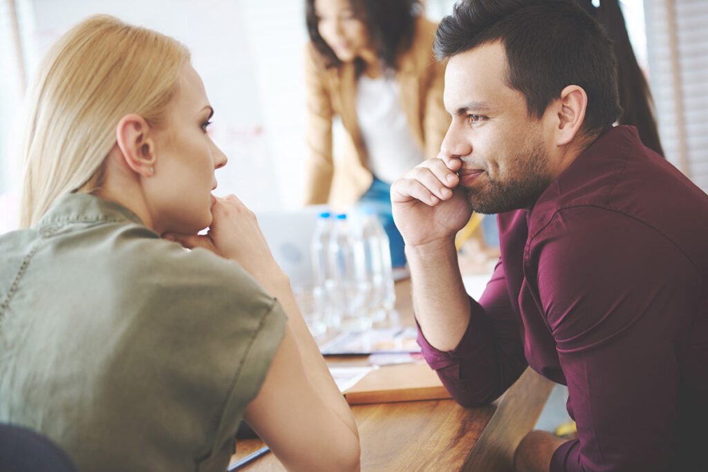 employees gossiping at workplace