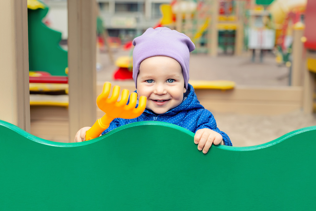 young child playing at kindergarten