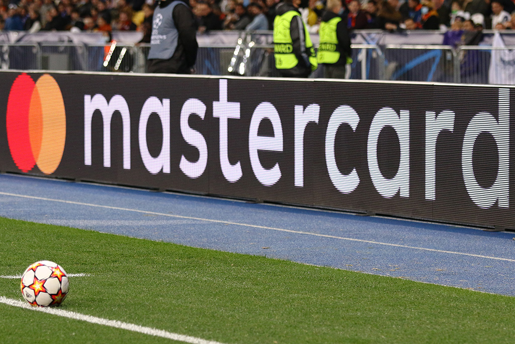 Mastercard sponsor billboard at soccer stadium